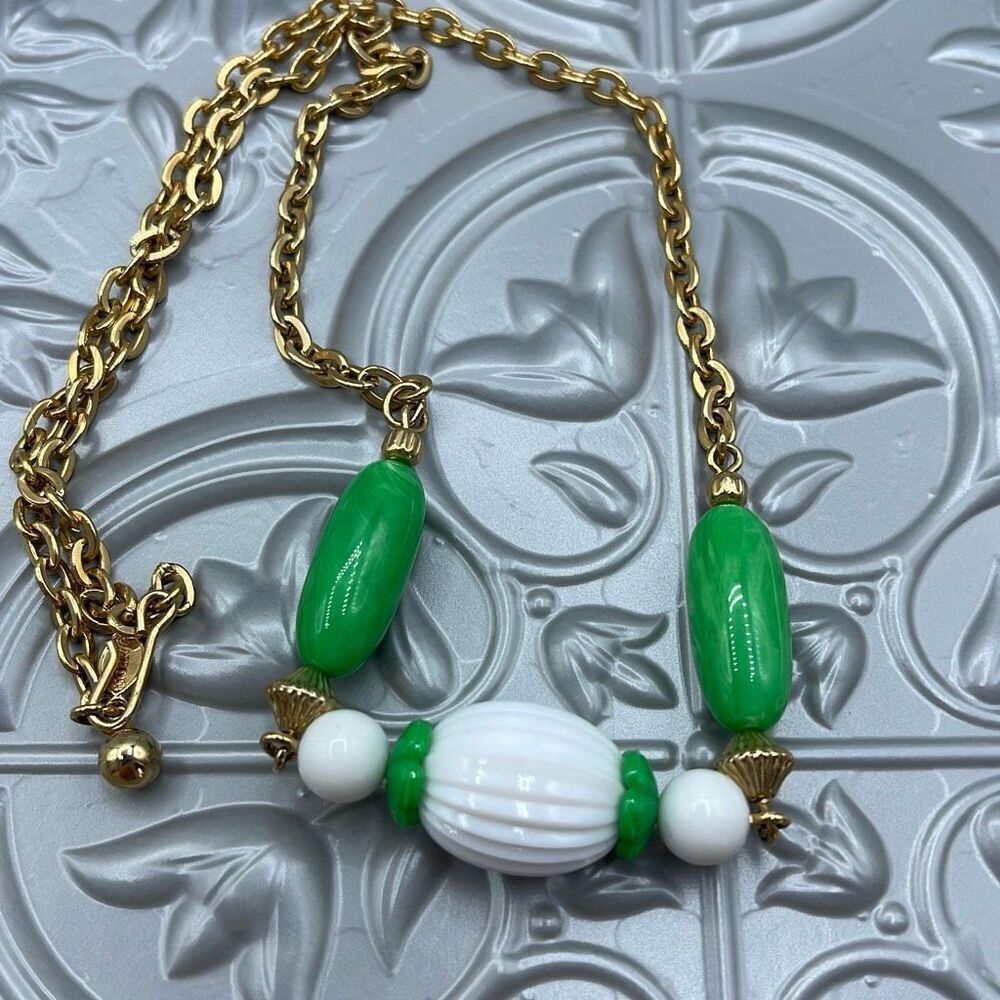 Vintage Avon 1975 “Come Summer” lucite and metal necklace.